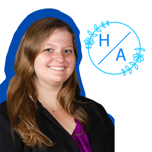 Hannah's professional headshot with her personal logo
